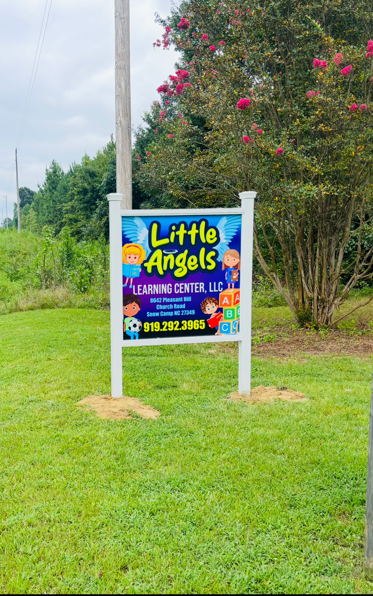 Little Angels Learning Center post-mounted yard sign